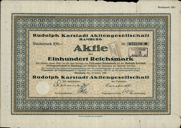 Ein altes deutsches Banknoten mit einem schwarzen Hintergrund und dem Text "Rudolph Karlstadt Aktiengesellschaft Hamburg" darauf gedruckt.