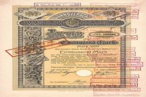 Alter deutscher Regierungsaktienchein mit rotem Stempel, Text und Zahlen auf altem Papier.