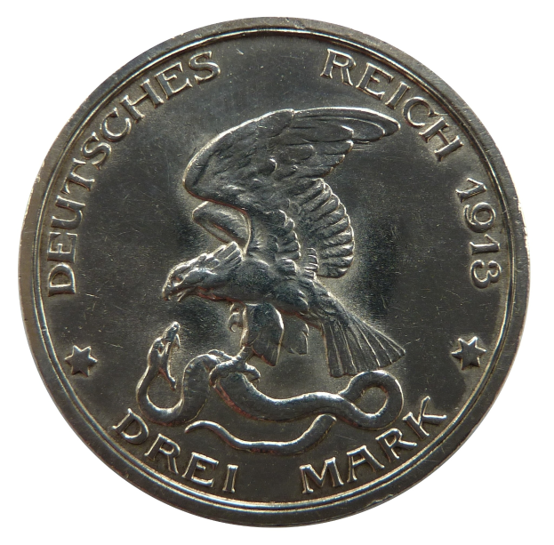 Silbermünze mit einem Adler, der eine Schlange umklammert, Flügel gespreizt, vor weißem Hintergrund, Text lautet "Deutsches Reich".