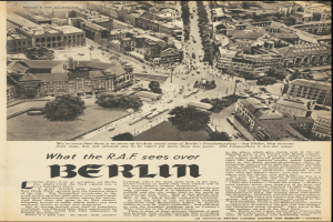 Alte Zeitung mit Schwarz-Weiß-Foto eines Stadtpanoramas mit Gebäuden, Bäumen und Fahrzeugen, begleitet von Text.