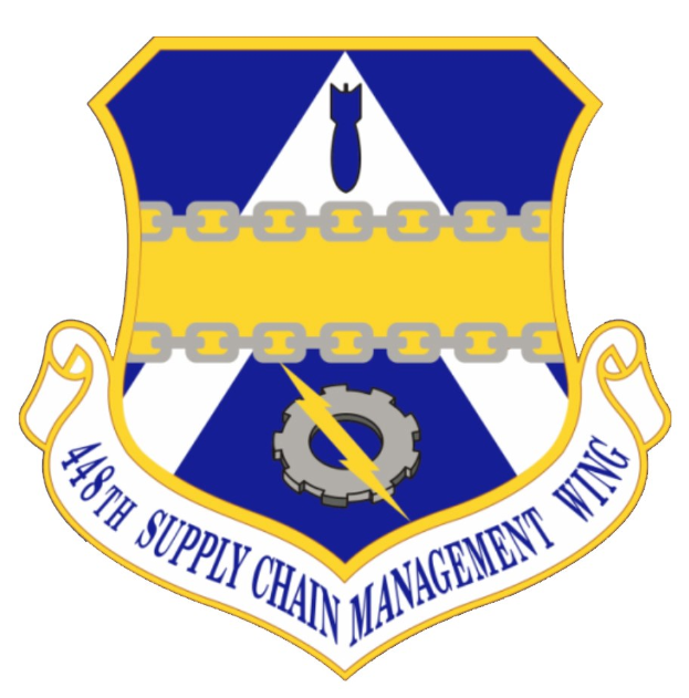 Logo der 48. Versorgungsmanagementstaffel mit einem blauen Schild mit einem weißen Stern, einem weißen Banner mit der Aufschrift "Versorgungsmanagement" in blau und dem Text "48. Versorgungsmanagementstaffel" in schwarz.
